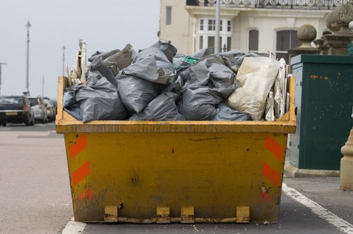 Professional house clearance team in Queens Park