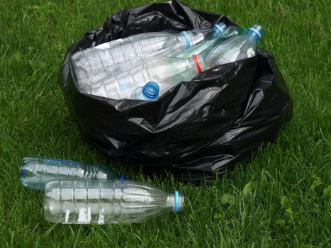 Professional waste clearance team at work in Queens Park
